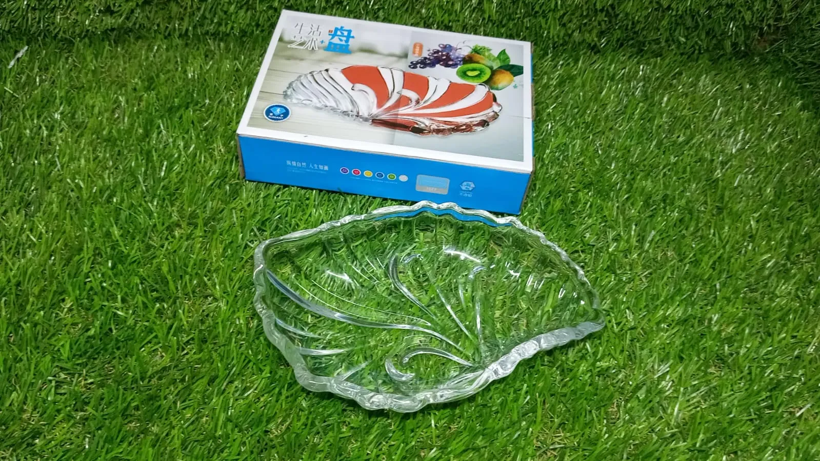 Leaf shaped Glass Serve tray of snacks, Mukhwaas, and ice cream.